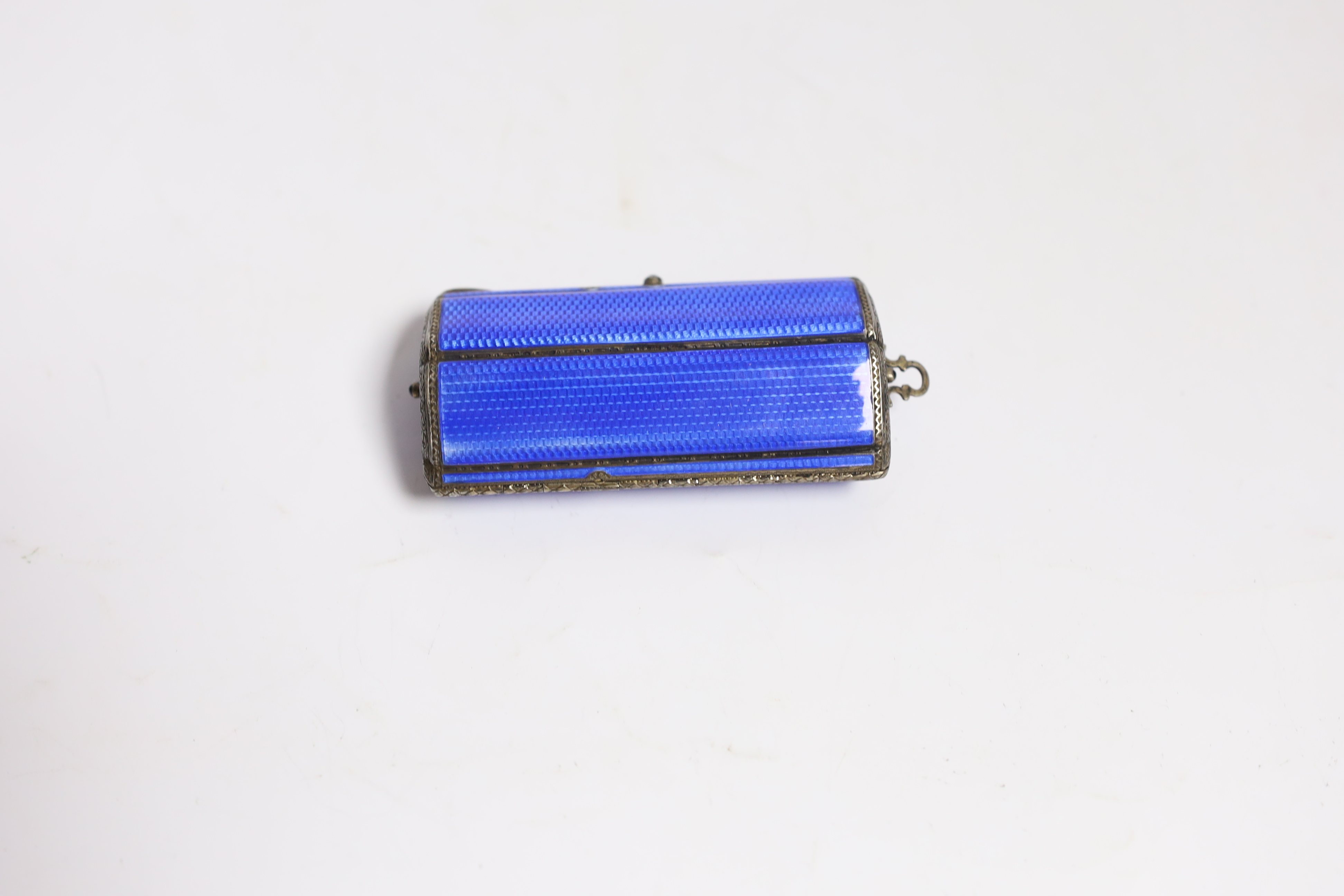 A lady's George V silver gilt and guilloche enamel minaudiere, of shaped oval form with compartmental interior, import marks for P.H. Vogel & Sons, London, 1923, 81mm.